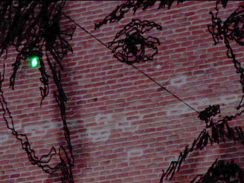 graffiti laser edificio cervantes